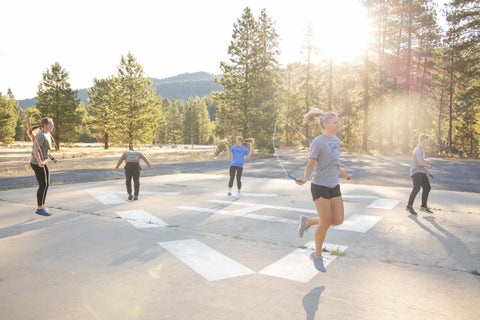 Elite-Jumps-Group-Of-People-Jumping-Rope
